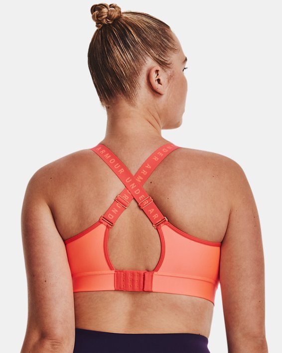 Women's UA Infinity Mid Covered Sports Bra in Orange image number 7